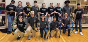 The Busbee Creative Arts Academy archery team (l-r): Back row Timia Riley, Madelyn Bjorn, Mason Williams, Jesse Everett, Averrie Bailey, Jaiya Johns, Sara Pittman, Gianni Vargas, and Wesley Daniels; Front row Colton Jennings, Dylan Sharpe, Zeke Baddourah, Edson Alarcon-Garcia, and Charlotte Wojcik. Not pictured: Sophia Brooks and Michael Shealy.