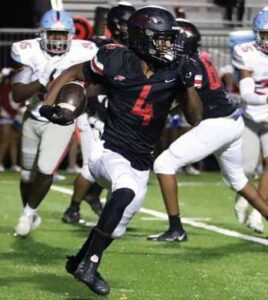 Westwood’s Jayden Harrison runs for yardage against A.C. Flora.
