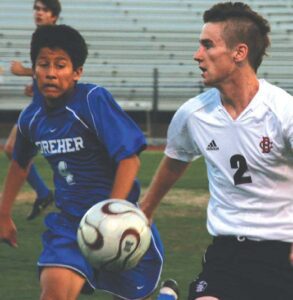 Dreher’s Byron Quinatoa and Brookland- Cayce’s Andrew Evans chase down the ball. File photo