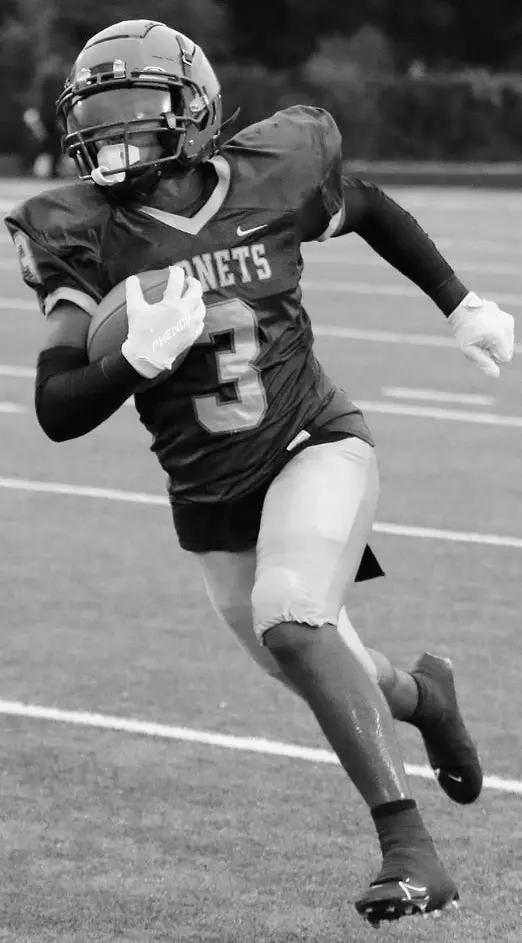 C.A. Johnson’s Caleb Pearson has rushed for 1,185 yards and 14 touchdowns on 115 carries. He’s completed 15-of-49 passes for 192 yards and three touchdowns. He also has six receptions for 86 yards. Photo by Mike Maddock