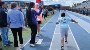 Athletes and their general education partners, along with volunteers, aides, Airport employees, and others enjoy the Area 7 Spring Games of the South Carolina Special Olympics, held at Airport High School April 11.