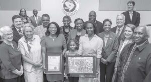 Richland County Council presents a proclamation to Aleysha Laureano and her mother.
