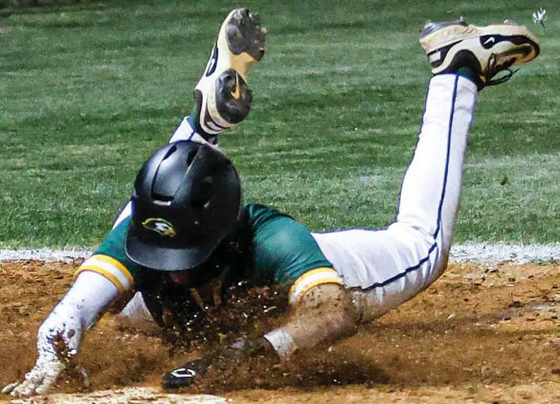 Ben Lippen’s David McElveen slides into home in the bottom of the fifth against Hammond. Photos by Mike Maddock