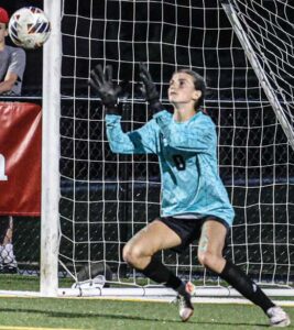 A.C. Flora’s Kennedy Bagley comes up with one of her 16 saves against Bishop England.