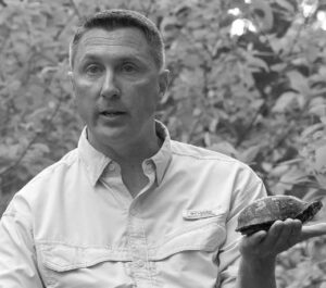 Naturalist Josh Arrants leads a nature walk at Belser Arboretum.