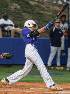 Airport’s Matthew Perry smashes an RBI single to right field in the fifth inning against Seneca.