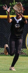 Gray Col legiate’s Na’Veah Matthews runs in to make a catch against York.