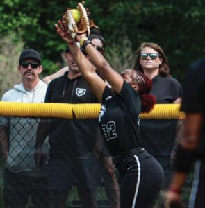 Gray Collegiate’s Maliah Wright makes a leaping catch against York.