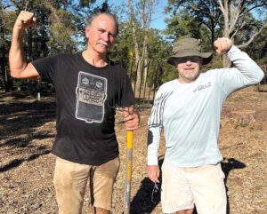 Dr. Buz Kloot and Ron Walrath apply much needed muscle to church grounds. Photo contributed by Buz Kloot