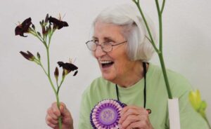 Peggy Jeffcoat holding ‘Lil’ Black Buds’