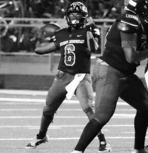 Dreher’s Walker Rowe (above left) and Chris Baker will battle for the starting quarterback position in 2025.