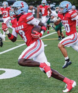 A.C. Flora’s Kendall Byrd returns an interception to the Eau Claire 2-yard line.