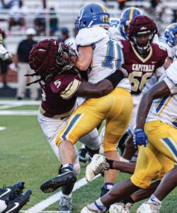 Columbia’s Rondrecus Peterson tackles Whitmire’s Kingston Green. Photos by Mike Maddock
