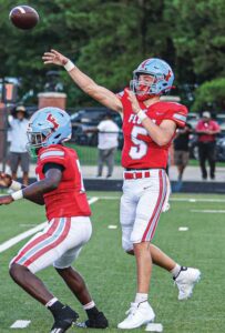 A. C. Flora’s Roper Wentzky threw three touchdown passes against Eau Claire in the Falcons’ Sportsarama game. Photos by Mike Maddock