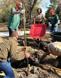 It takes teamwork to plant 1,250 shade trees. Photos contributed by Columbia Green