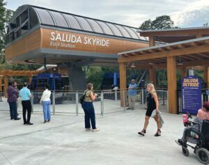 Patrons take in the Saluda Skyride at a VIP event.
