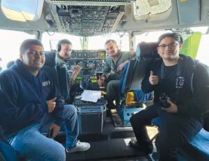 First-year cadet freshman Trinh Nguyen and fourth-year cadet senior Ashley Munoz Rosales aboard a U.S. Air Force C-17 Globemaster III.