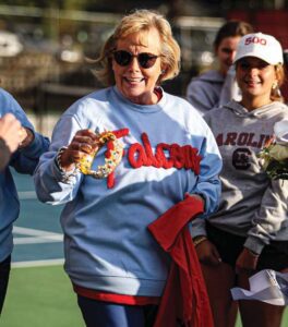 A.C. Flora head coach Amy Martin is honored after the second round playoff match against Fountain Inn for getting her 500th career victory. Martin’s team gave her a crown along with a banner, hats, and a tshirt commemorating her accomplishment.