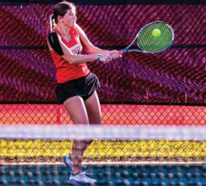 A.C. Flora No. 1 Emily Smith rips a backhand in her match against Daniel’s Helena Billinis.