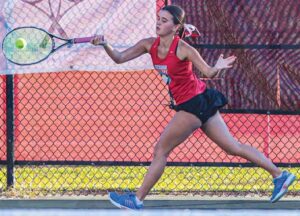 A.C. Flora No. 2 Catherine Smith lunges to return a shot against Daniel’s Julia Wolin.