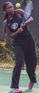 Gray Collegiate No. 1 Morgan Horlback hits a backhand in her match against A.C. Flora’s Emily Smith.
