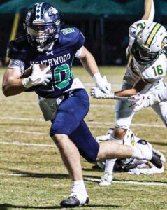 Heathwood Hall’s Julian Hughes gets in the open field against Ben Lippen.