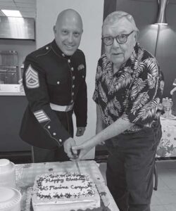U.S. Marine Gunnery Sergeant Zack Long and Larry Willis